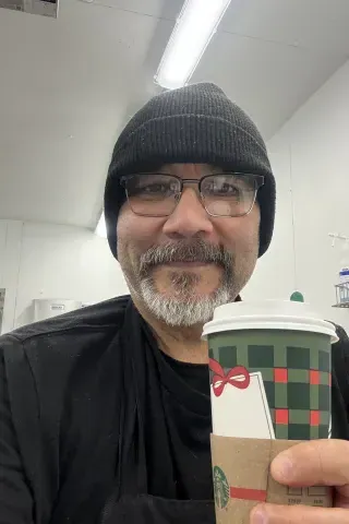 Smiling with coffee