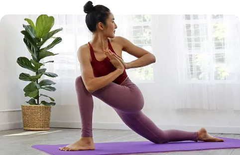 woman doing yoga in mid-pose
