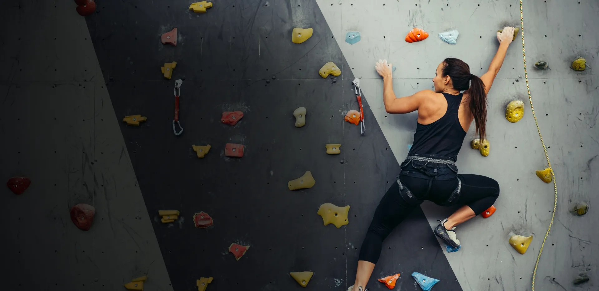woman rock climbing