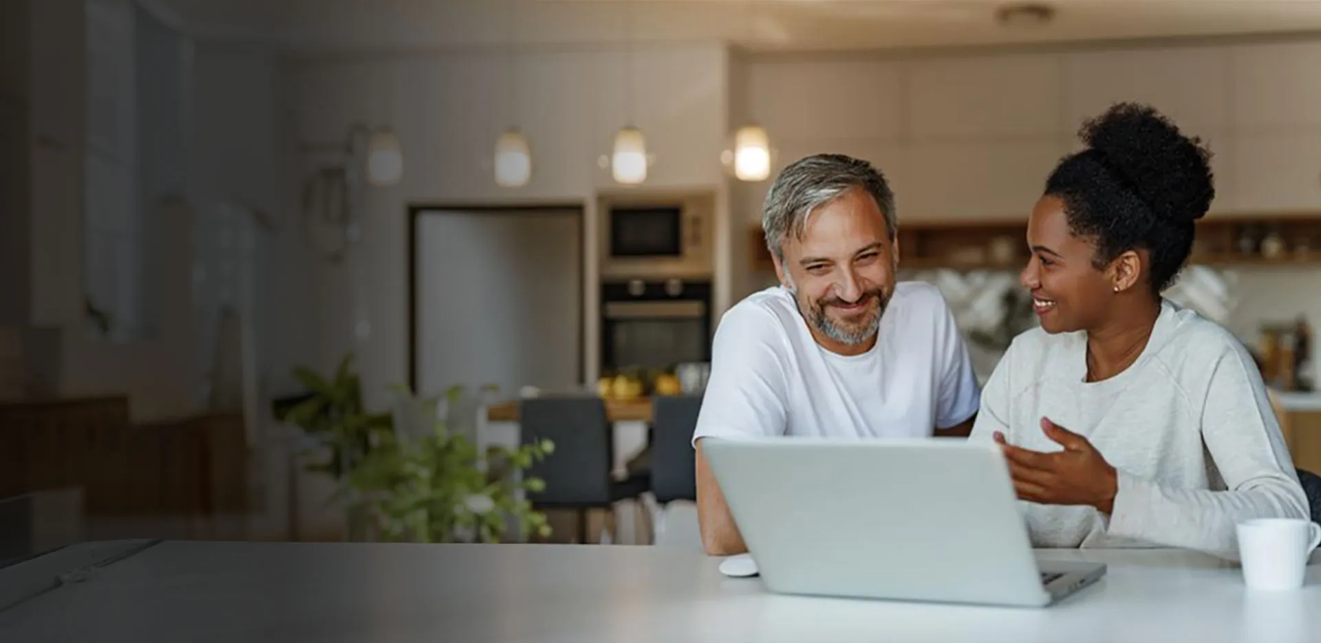 older couple looking at a laptop together